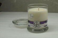 Load image into Gallery viewer, The Status’ sleek, urban style Black Amber &amp; Lavender Status Candle with glass lid blends elegantly for modern or contemporary interiors. This has been a popular candle for G.P. Soy for many years. The container is made by Libbey and can be easily repurposed after the candle is finished burning.  This fragrance has been a best seller for over 8 yrs. The black amber plum is the top note and the lower note is the lavender and the combo is amazing, give it a go!

