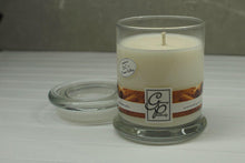Load image into Gallery viewer, The Status’ sleek, urban style Cinnamon Status Candle with glass lid blends elegantly for modern or contemporary interiors. This has been a popular candle for G.P. Soy for many years. The container is made by Libbey and can be easily repurposed after the candle is finished burning.  This fragrance is simply a strong aroma of cinnamon sticks and nothing else. Bestseller for many years.
