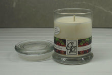 Load image into Gallery viewer, The Status’ sleek, urban style Cranberry Pine Status Candle with glass lid blends elegantly for modern or contemporary interiors. This has been a popular candle for G.P. Soy for many years. The container is made by Libbey and can be easily repurposed after the candle is finished burning.  An excellent duo of fragrances for the Holiday Season.  Sweet pine with tones of tart Cranberry plus subtle hints of warm Vanilla and Cinnamon.  Just perfect for your holiday entertainment or at home alone.
