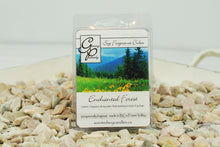 Load image into Gallery viewer, Positively Glowing Soy Candles enchanted fragrance cubes work in most electric melters and provide a safe way to have beautiful fragrance all day long. A unique blend of fir, balsam, Asian spices, rich musk and a hint of mint and bay leaf oil.  A great woodsy aroma good all year round.
