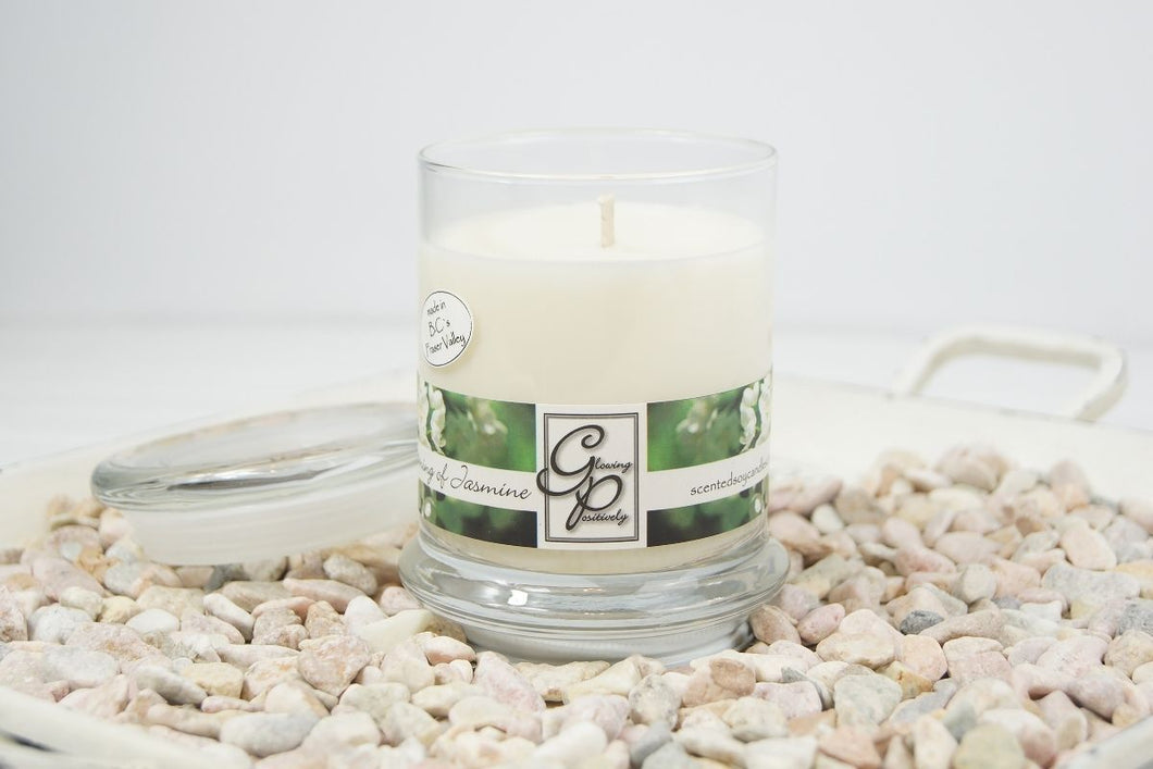 The Status’ sleek, urban style Jasmine Status Candle with glass lid blends elegantly for modern or contemporary interiors. This has been a popular candle for G.P. Soy for many years. The container is made by Libbey and can be easily repurposed after the candle is finished burning.  You will love this strong and lush scent!  A floral blend of Indian jasmine with touch of African ylang. 