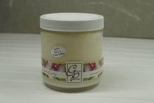 Load image into Gallery viewer, The Status’ sleek, urban style Just Lovely Status Candle blends elegantly for modern or contemporary interiors. This has been a popular candle for G.P. Soy for many years. The container is made by Libbey and can be easily repurposed after the candle is finished burning.  This is a fruity floral fragrance that is a favorite for years.  Peach, chamomile, cherry blossom and a hint of almond and jasmine.  This fragrance will help you find your inner diva.
