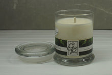 Load image into Gallery viewer, The Status’ sleek, urban style Sweet Pine Status Candle with glass lid blends elegantly for modern or contemporary interiors. This has been a popular candle for G.P. Soy for many years. The container is made by Libbey and can be easily repurposed after the candle is finished burning.  A bestseller during the holiday season.  Enjoy a blend of sweet aromatic pine, very vanilla and spicy cinnamon.  Your friends will think your fake tree is the real thing.
