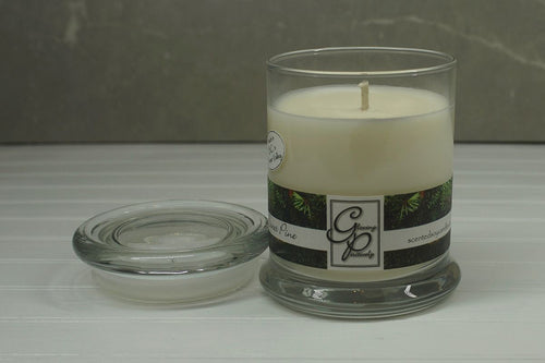 The Status’ sleek, urban style Sweet Pine Status Candle with glass lid blends elegantly for modern or contemporary interiors. This has been a popular candle for G.P. Soy for many years. The container is made by Libbey and can be easily repurposed after the candle is finished burning.  A bestseller during the holiday season.  Enjoy a blend of sweet aromatic pine, very vanilla and spicy cinnamon.  Your friends will think your fake tree is the real thing.
