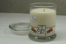 Load image into Gallery viewer, The Status’ sleek, urban style Tis&#39; the Season Status Candle with glass lid blends elegantly for modern or contemporary interiors. This has been a popular candle for G.P. Soy for many years. The container is made by Libbey and can be easily repurposed after the candle is finished burning.  This scent has the right balance of pine, fruit and spices to help you get that Holiday Feeling.  It is enjoyable all year round but especially wonderful during the season of snow and jingle bells.
