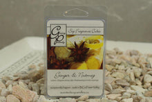 Load image into Gallery viewer, Positively Glowing Soy Candles ginger and nutmeg fragrance cubes work in most electric melters and provide a safe way to have beautiful fragrance all day long. This is a spicy fragrance that is out of the norm.  Top note of Nutmeg and a middle note of ginger which is enhanced by Lily, Honeysuckle and musk.  A truly great combo to enjoy.
