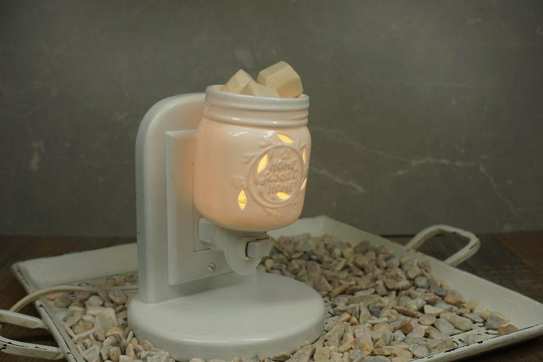 The White Mason Jar Electric Wax Melter is an interiors ‘must have’ for your home to help fill it with your chosen fragrance safely. Electric Melters are the perfect size to plug into small places; above your kitchen counter, bathroom or hallway and they also make a great night lights!